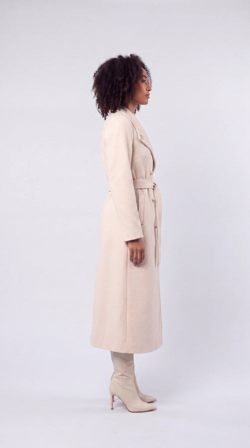 Evorenne cream belted double-breasted trench coat, side view